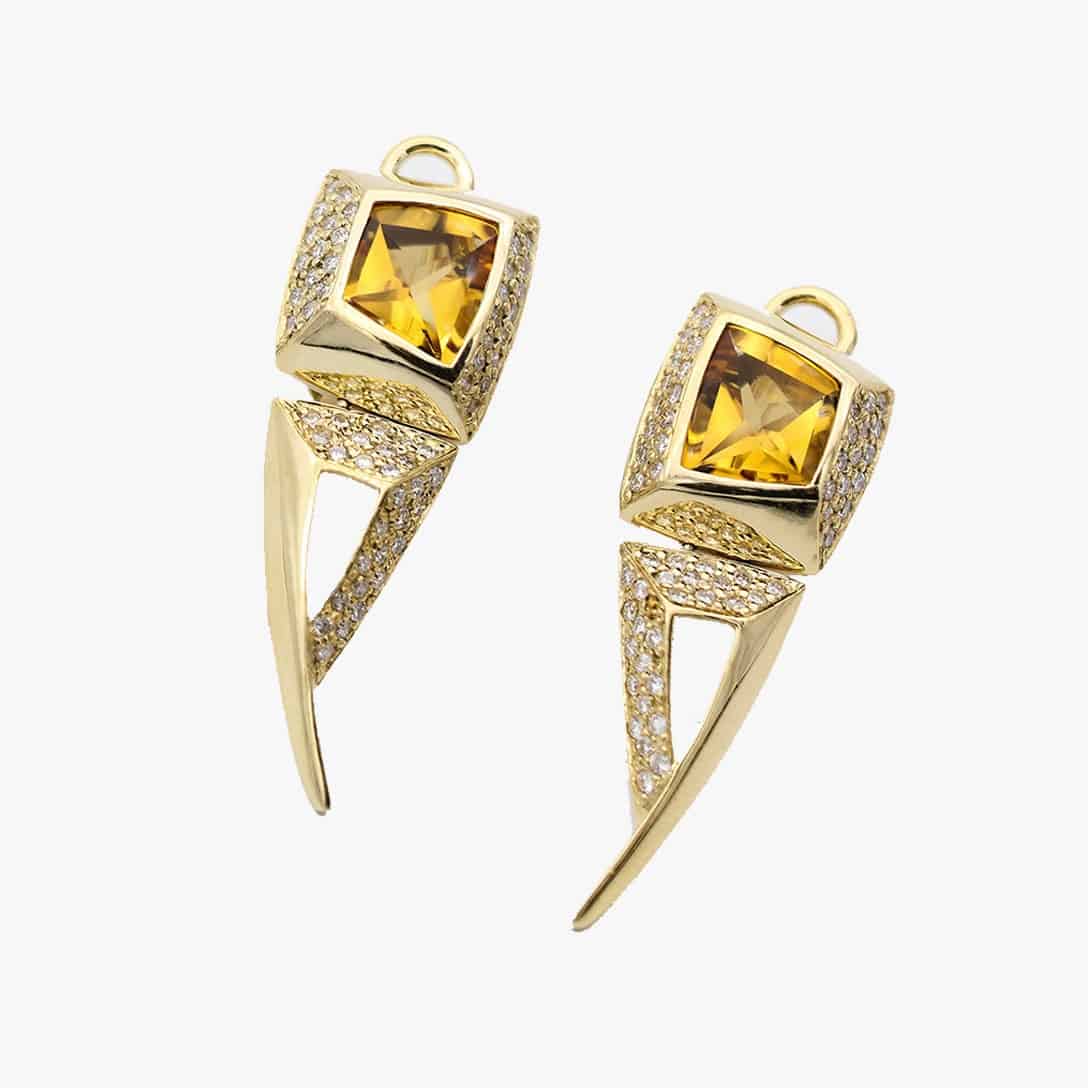 Aretes de plata con acento de diamante
